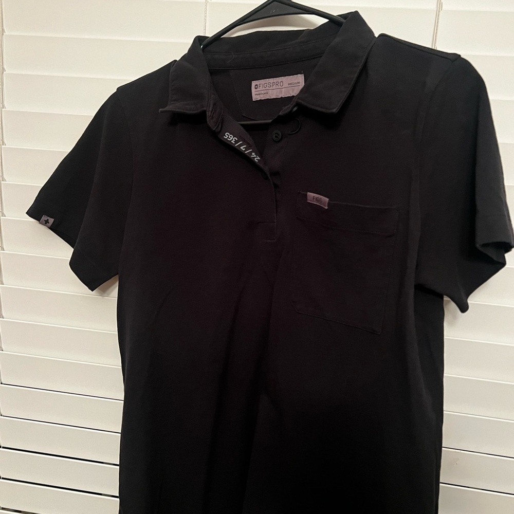 Nala (limited edition) polo with front pocket.